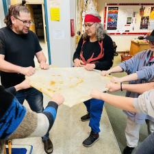 students stretching the rawhide